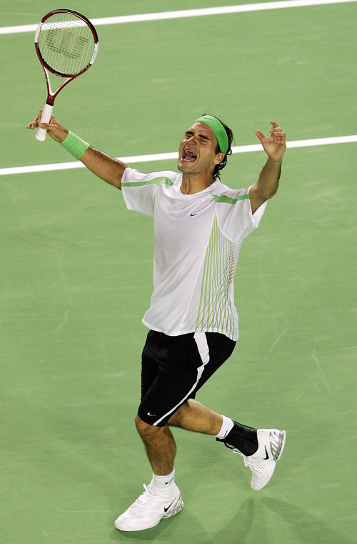 An emotional Roger Federer celebrates winning the 2006 Australian Open