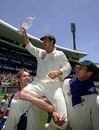 Brett Lee and Stuart Clark chair Justin Langer off the SCG in his last Test