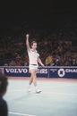 John McEnroe raises his fist in triumph against Ivan Lendl