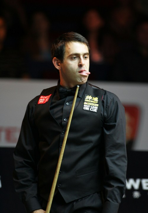 Ronnie O'Sullivan ponders his next shot in the match against Ding Junhui 