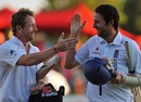 Paul Collingwood and Graham Onions celebrate after holding on for a draw