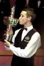 Stephen Hendry celebrates victory against Mark Williams in the1999 Embassy World Snooker Championship final