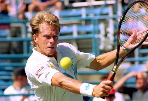 Stefan Edberg hits a backhand volley against Michael Chang in the 1992 US Open
