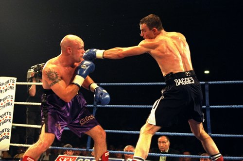 Richie Woodhall (right) strikes Glenn Catley during their fight in Telford