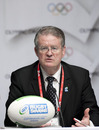 IRB president Bernard Lapasset celebrate the inclusion rugby sevens' for the 2016 Olympics