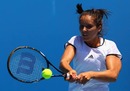 Laura Robson plays a backhand in her juniors match against Belinda Woolcock