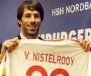 Ruud van Nistelrooy holds his new Hamburg shirt