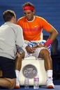 Rafael Nadal receives treatment on his knee during his loss to Andy Murray