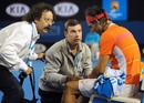 Rafael Nadal consults the doctor during his loss to Andy Murray