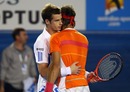 Andy Murray consoles Rafael Nadal after the Spaniard is forced to retire