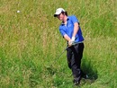Rory McIlroy plays his approach shot during the pro-am