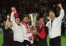 Liverpool management and coaching staff Sammy Lee, Patrice Bergues, Phil Thompson, Gerard Houllier and Joe Corrigan celebrate victory