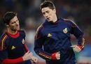 Fernando Torres warms up with Xabi Alonso