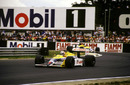 Nigel Mansell races away from team-mate Nelson Piquet