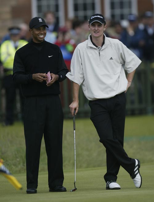 Tiger Woods and Justin Rose share a joke