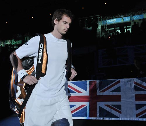 Andy Murray walks onto the court