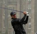 Luke Donald battles with the elements