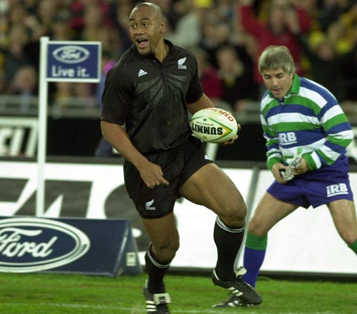 Jonah Lomu is all smiles as heads to score the winning try