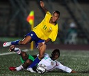 Neymar is tackled by Gil Cordero