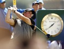Phil Mickelson drives from the fourth tee