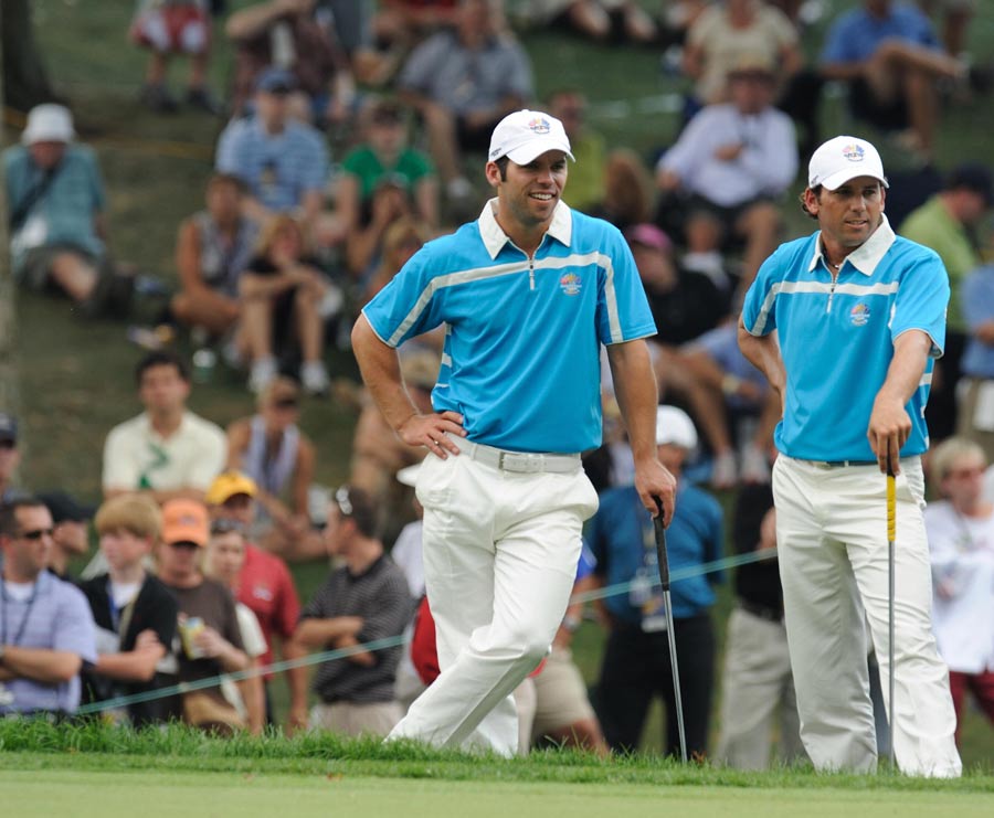 Paul Casey and Sergio Garcia wait for the US team to play