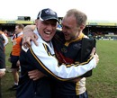 Leeds coach Neil Back and fly-half Ceiron Thomas celebrate survival