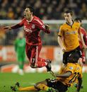 Maxi Rodriguez leaps to avoid a tackle