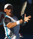 Nikolay Davydenko hits a forehand during his quarter-finals clash with Roger Federer