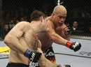 Tito Ortiz throws a right at Forrest Griffin