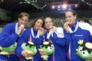 Karen Pickering, Karen Legg, Janine Belton and Nicole Jackson receive gold medals for Great Britain