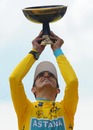 Alberto Contador lifts the trophy