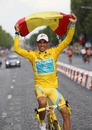 Alberto Contador celebrates on the streets of Paris