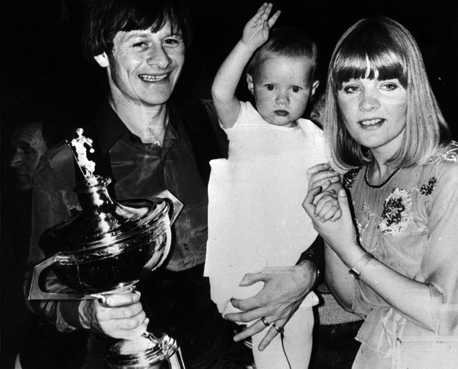 Alex Higgins celebrates with his wife and daughter