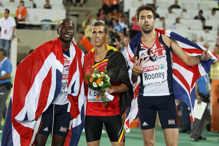 Michael Bingham and Martyn Rooney celebrate winning silver and bronze respectively