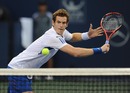 Andy Murray guards the net against Feliciano Lopez