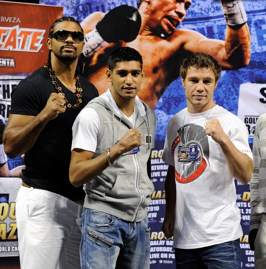 David Haye, Amir Khan and Michael Katsidis appear during the official weigh-in 