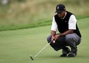 Tiger Woods gives the greens a rueful look