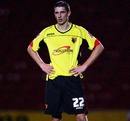 Craig Cathcart stands waiting for play to restart