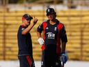 Andy Flower gives advice to Alastair Cook
