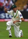 Umar Gul looks on after the ball escaped his clutches