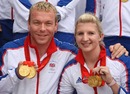 Sir Chris Hoy and Rebecca Adlington show off their medals from Beijing