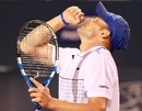 Andy Roddick reacts after winning a point