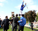 Frankie Dettori performs a flying dismount