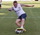 Craig Bellamy controls the ball during a training session