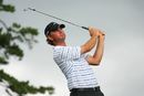Lucas Glover hoists it with the iron