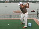 Phil Mickelson prepares to smack the ball into the Hudson River