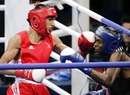 Amir Khan unleashes a combination against Mario Cesar Kindelan