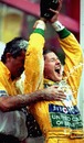 Michael Schumacher pours champagne over his head