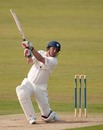 Phil Mustard drives through the covers