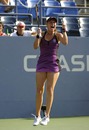 Kateryna Bondarenko jumps for joy after beating Li Na